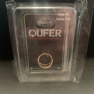 Brand new nose/cartilage/targus piercing. Rose colored stainless steel